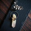 A massive 3.25-inch copper electroformed pendant featuring a central misty Blue Smoke Mine quartz point flanked by three clear quartz crystals.