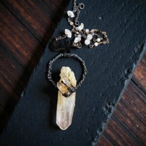 A massive 3.25-inch copper electroformed pendant featuring a central misty Blue Smoke Mine quartz point flanked by three clear quartz crystals.
