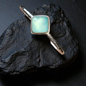 Sterling silver cuff bracelet with Blue Green Chalcedony cabochon.