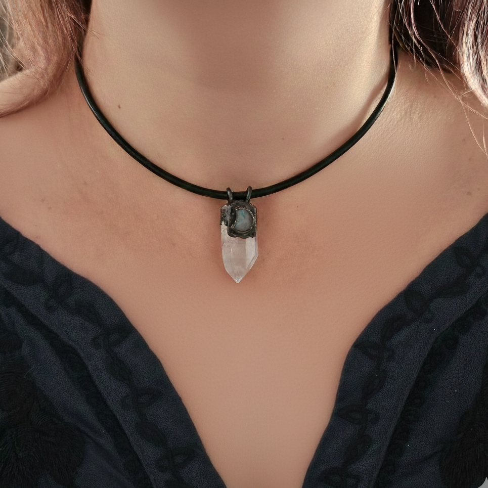 The Navigator amulet shown on a model to capture the 1.50-inch scale and how it sits on the chest.