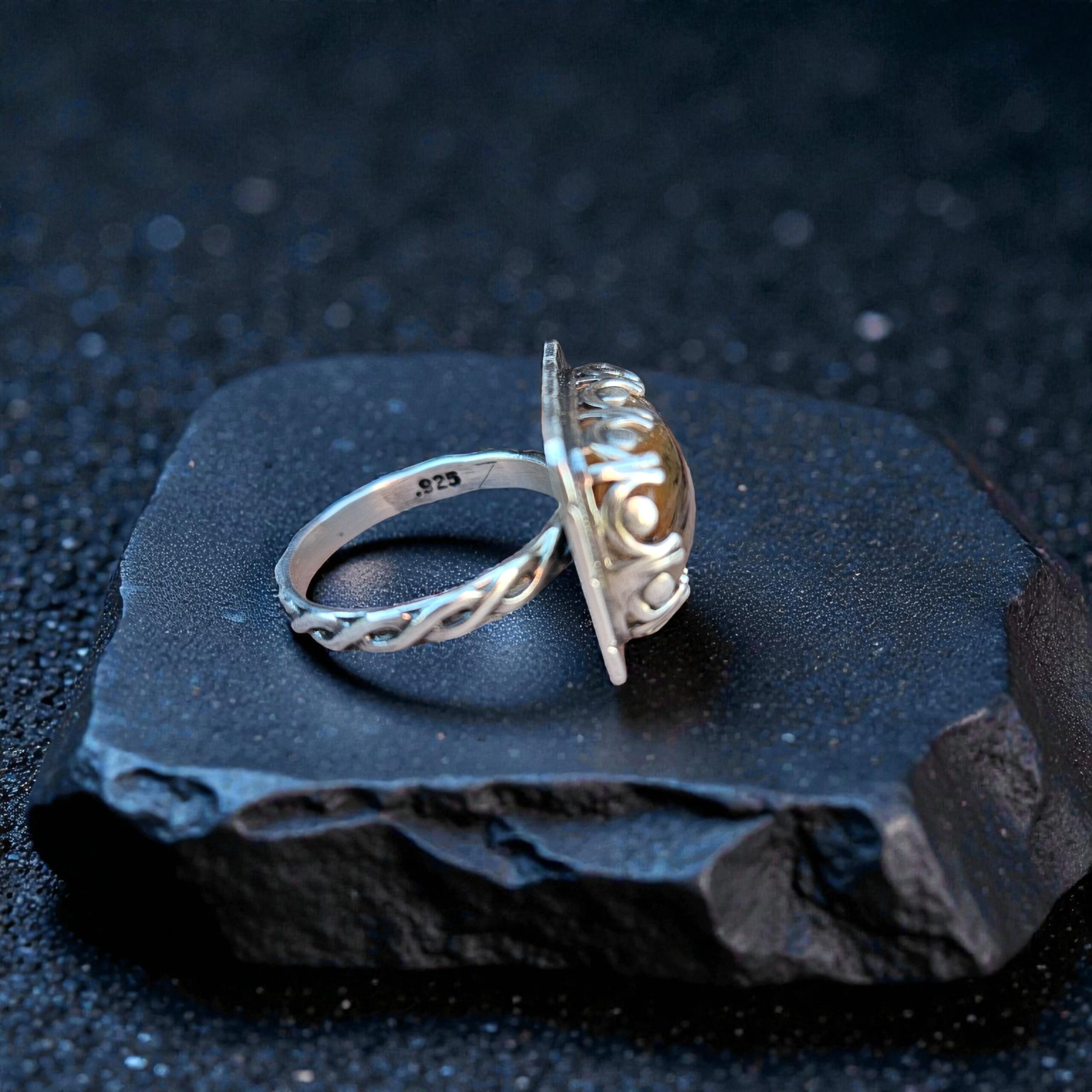 Close-up of the single woven pattern sterling silver band on the size 8.25 Sentry ring.