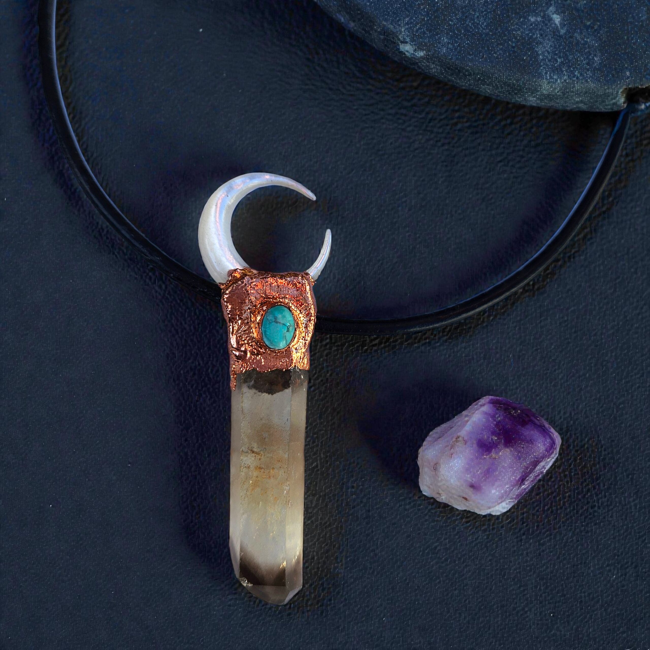 Close-up of the "ink-tipped" smoky quartz and the intricate copper bezel holding the turquoise and pearl moon.