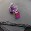 A square pink aura druzy ring styled with a raw amethyst stone to highlight heart chakra ritual energy.